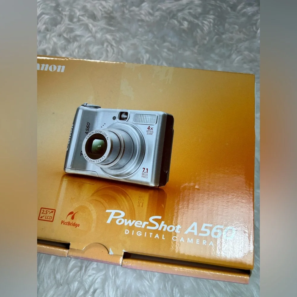 CANON POWER SHOT A560 BOX AND PAPERS DISK ONLY NO CAMERAS
